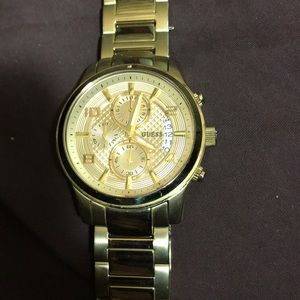 Men’s gold guess watch